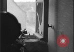 Image of street fighting US soldiers Halle Germany, 1945, second 39 stock footage video 65675078458
