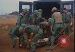 Image of Vietnam War wounded evacuated Khe Sanh Vietnam, 1968, second 29 stock footage video 65675078586