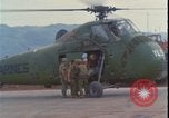 Image of wounded unloaded from Sikorsky H-34 Khe Sanh Vietnam, 1968, second 3 stock footage video 65675078587