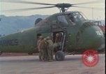 Image of wounded unloaded from Sikorsky H-34 Khe Sanh Vietnam, 1968, second 4 stock footage video 65675078587