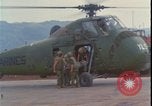 Image of wounded unloaded from Sikorsky H-34 Khe Sanh Vietnam, 1968, second 5 stock footage video 65675078587