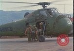 Image of wounded unloaded from Sikorsky H-34 Khe Sanh Vietnam, 1968, second 7 stock footage video 65675078587