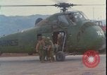 Image of wounded unloaded from Sikorsky H-34 Khe Sanh Vietnam, 1968, second 8 stock footage video 65675078587