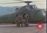 Image of wounded unloaded from Sikorsky H-34 Khe Sanh Vietnam, 1968, second 9 stock footage video 65675078587
