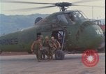 Image of wounded unloaded from Sikorsky H-34 Khe Sanh Vietnam, 1968, second 10 stock footage video 65675078587