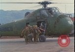 Image of wounded unloaded from Sikorsky H-34 Khe Sanh Vietnam, 1968, second 11 stock footage video 65675078587