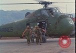 Image of wounded unloaded from Sikorsky H-34 Khe Sanh Vietnam, 1968, second 12 stock footage video 65675078587