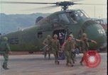 Image of wounded unloaded from Sikorsky H-34 Khe Sanh Vietnam, 1968, second 15 stock footage video 65675078587