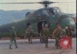 Image of wounded unloaded from Sikorsky H-34 Khe Sanh Vietnam, 1968, second 16 stock footage video 65675078587