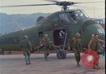 Image of wounded unloaded from Sikorsky H-34 Khe Sanh Vietnam, 1968, second 17 stock footage video 65675078587