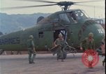 Image of wounded unloaded from Sikorsky H-34 Khe Sanh Vietnam, 1968, second 18 stock footage video 65675078587