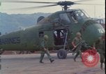 Image of wounded unloaded from Sikorsky H-34 Khe Sanh Vietnam, 1968, second 19 stock footage video 65675078587