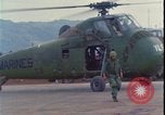 Image of wounded unloaded from Sikorsky H-34 Khe Sanh Vietnam, 1968, second 21 stock footage video 65675078587