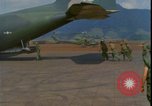 Image of wounded unloaded from Sikorsky H-34 Khe Sanh Vietnam, 1968, second 30 stock footage video 65675078587