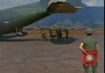 Image of wounded unloaded from Sikorsky H-34 Khe Sanh Vietnam, 1968, second 34 stock footage video 65675078587