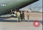Image of wounded unloaded from Sikorsky H-34 Khe Sanh Vietnam, 1968, second 35 stock footage video 65675078587