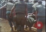 Image of wounded unloaded from Sikorsky H-34 Khe Sanh Vietnam, 1968, second 40 stock footage video 65675078587