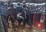 Image of wounded unloaded from Sikorsky H-34 Khe Sanh Vietnam, 1968, second 42 stock footage video 65675078587
