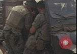 Image of wounded unloaded from Sikorsky H-34 Khe Sanh Vietnam, 1968, second 48 stock footage video 65675078587