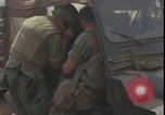 Image of wounded unloaded from Sikorsky H-34 Khe Sanh Vietnam, 1968, second 49 stock footage video 65675078587