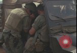 Image of wounded unloaded from Sikorsky H-34 Khe Sanh Vietnam, 1968, second 50 stock footage video 65675078587