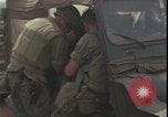 Image of wounded unloaded from Sikorsky H-34 Khe Sanh Vietnam, 1968, second 51 stock footage video 65675078587