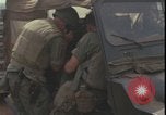 Image of wounded unloaded from Sikorsky H-34 Khe Sanh Vietnam, 1968, second 53 stock footage video 65675078587