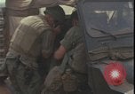 Image of wounded unloaded from Sikorsky H-34 Khe Sanh Vietnam, 1968, second 54 stock footage video 65675078587