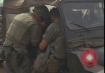 Image of wounded unloaded from Sikorsky H-34 Khe Sanh Vietnam, 1968, second 57 stock footage video 65675078587