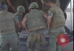Image of Vietnam War wounded evacuated C-130 Khe Sanh Vietnam, 1968, second 16 stock footage video 65675078591