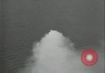 Standbild Antenne raid-Japanischen base Pazifischer Ozean, 1944, aus Sekunde 15 historischem Filmmaterial Videoclip 65675078598