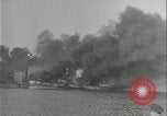 Standbild Schiffe in Brand Europäische Theater, 1944, aus Sekunde 6 historischem Filmmaterial Videoclip 65675078604