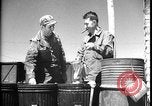 Image of United States soldiers wash mess kits Iran, 1944, second 33 stock footage video 65675078626