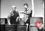 Image of United States soldiers wash mess kits Iran, 1944, second 34 stock footage video 65675078626