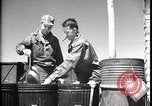 Image of United States soldiers wash mess kits Iran, 1944, second 36 stock footage video 65675078626