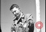 Image of United States soldiers wash mess kits Iran, 1944, second 47 stock footage video 65675078626