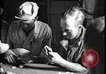 Immagine di I soldati degli Stati Uniti giocano a poker Iran, 1944, secondo 42 filmato di repertorio 65675078628