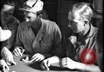 Immagine di I soldati degli Stati Uniti giocano a poker Iran, 1944, secondo 48 filmato di repertorio 65675078628