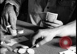 Immagine di I soldati degli Stati Uniti giocano a poker Iran, 1944, secondo 61 filmato di repertorio 65675078628