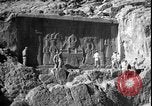 Image of United States soldiers inspect Fath Ali Shah Inscription WW2 Rey Iran, 1944, second 20 stock footage video 65675078630