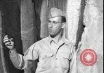 Image of United States soldiers inspect Fath Ali Shah Inscription WW2 Rey Iran, 1944, second 33 stock footage video 65675078630