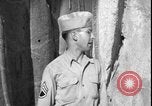 Image of United States soldiers inspect Fath Ali Shah Inscription WW2 Rey Iran, 1944, second 35 stock footage video 65675078630