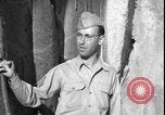 Image of United States soldiers inspect Fath Ali Shah Inscription WW2 Rey Iran, 1944, second 38 stock footage video 65675078630