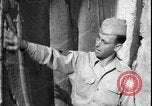 Image of United States soldiers inspect Fath Ali Shah Inscription WW2 Rey Iran, 1944, second 50 stock footage video 65675078630