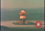 Image of aerial view atom bomb explosion Nevada United States USA , 1958, second 27 stock footage video 65675078689