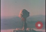 Image of aerial view atom bomb explosion Nevada United States USA , 1958, second 53 stock footage video 65675078689
