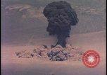 Image of aerial view Cold War nuclear test Nevada United States USA , 1958, second 32 stock footage video 65675078690