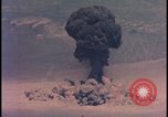 Image of aerial view Cold War nuclear test Nevada United States USA , 1958, second 34 stock footage video 65675078690