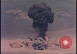 Image of aerial view Cold War nuclear test Nevada United States USA , 1958, second 35 stock footage video 65675078690