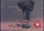 Image of aerial view Cold War nuclear test Nevada United States USA , 1958, second 42 stock footage video 65675078690